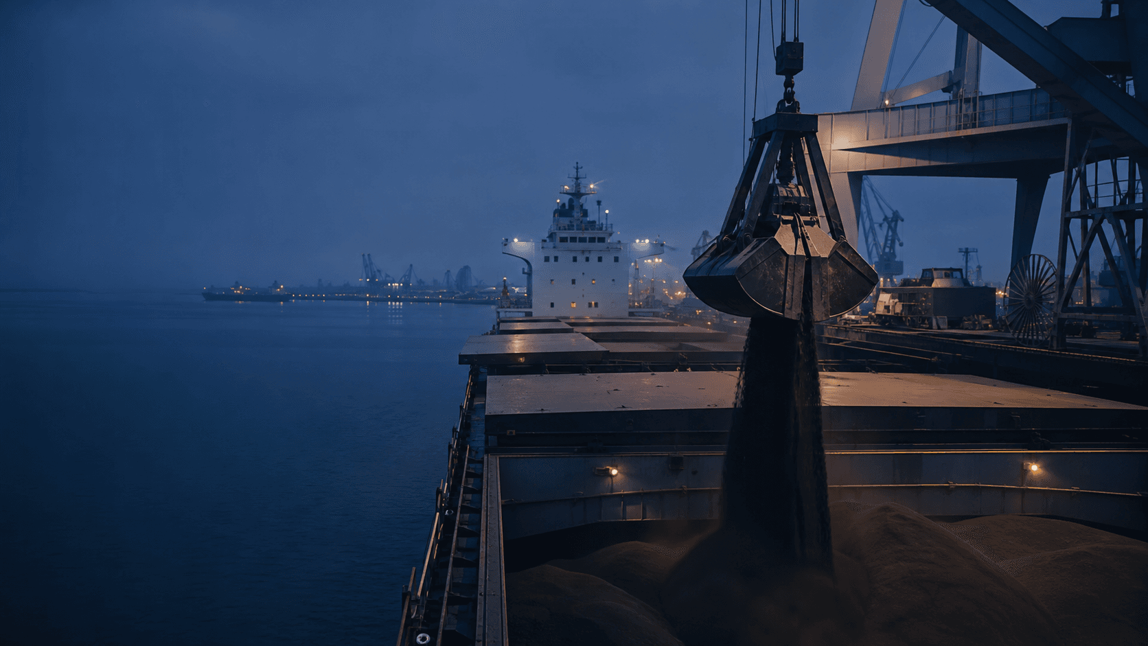 Bulk cargo being loaded into an ocean-going carrier